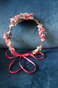 Ein Blumenkranz von Kopflegenden